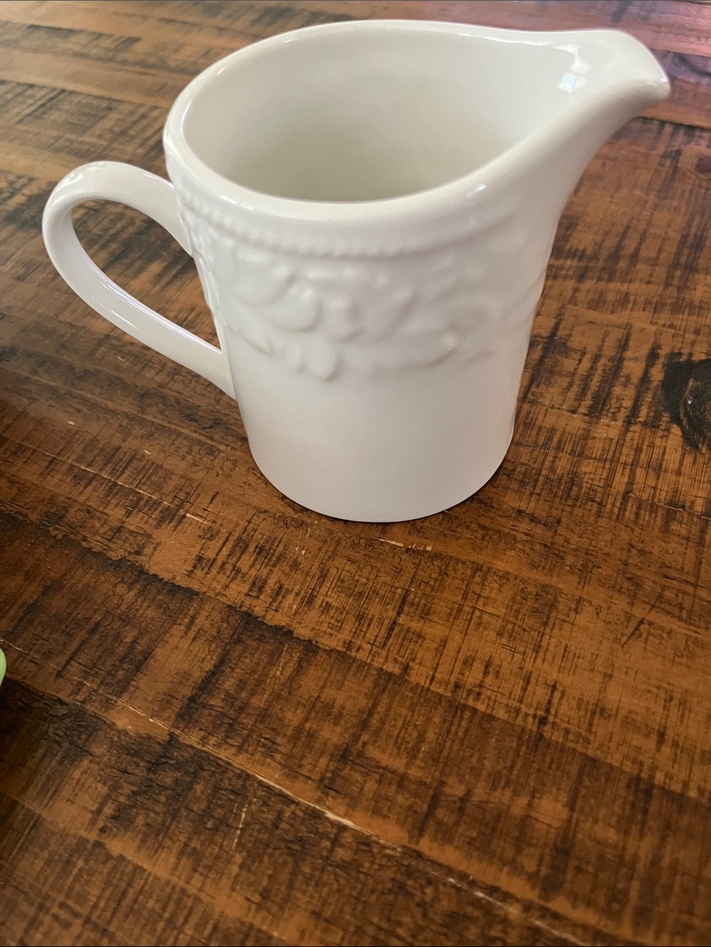 Classic White Ceramic Creamer with Embossed Detail